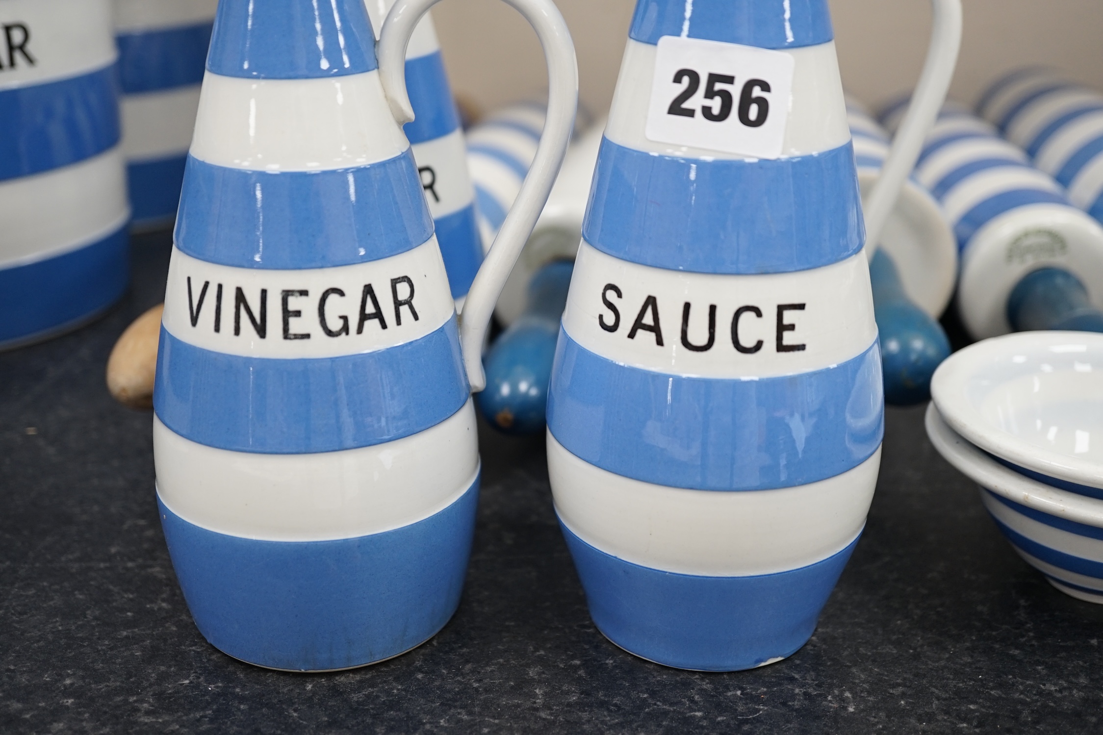T.G.Green Cornish Kitchenware, six rolling pins one marked Cocogem but four unbranded, four Vinegar, Sauce and oil bottles, four small unnamed lidded storage jars and two egg separators mainly Green Shield marks. Conditi